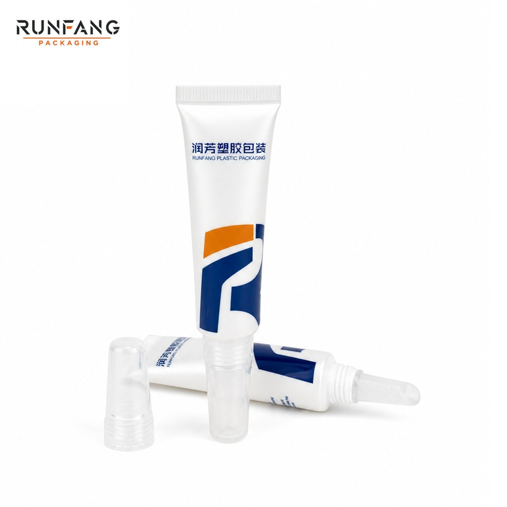 Tube de gloss à lèvres en plastique souple de 19 mm avec embout en silicone